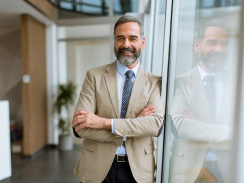 Man smiling in an office