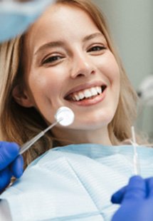 Woman smiling during dental checkup